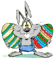 easter rabbit with two large striped eggs animated gif